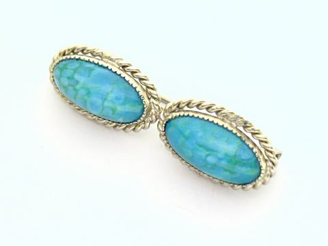 60342-0 Feine Damen Brosche wunderschön in türkis neu vom Hersteller Juwelier Harnisch mit eleganten Details und feinem Türkis Look, ideal für stilvolle Akzente.