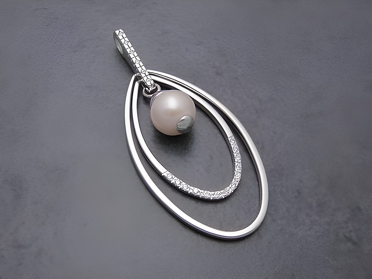 Design Sterling Silber Anhänger mit Zirkonia und Süßwasser Perle in ovaler Form, dekorativ und modern, hergestellt von Juwelier Harnisch, vielseitig einsetzbar.