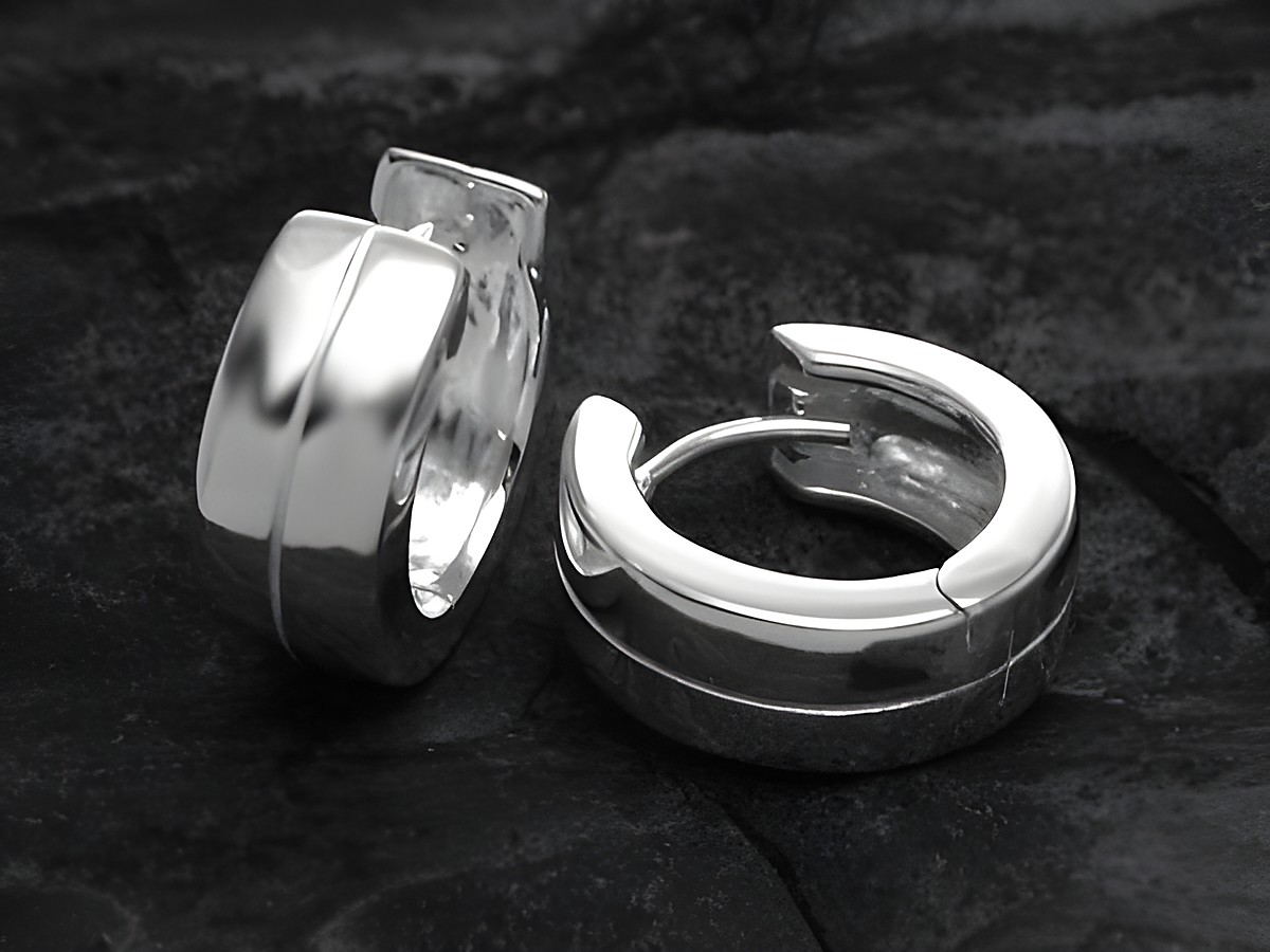 Creolen aus 925 Sterling Silber mit dezentem Schliff, hergestellt von Juwelier Harnisch, Durchmesser bis 15 mm, zeitloses und elegantes Design. Ideal für den Alltag oder besondere Anlässe.