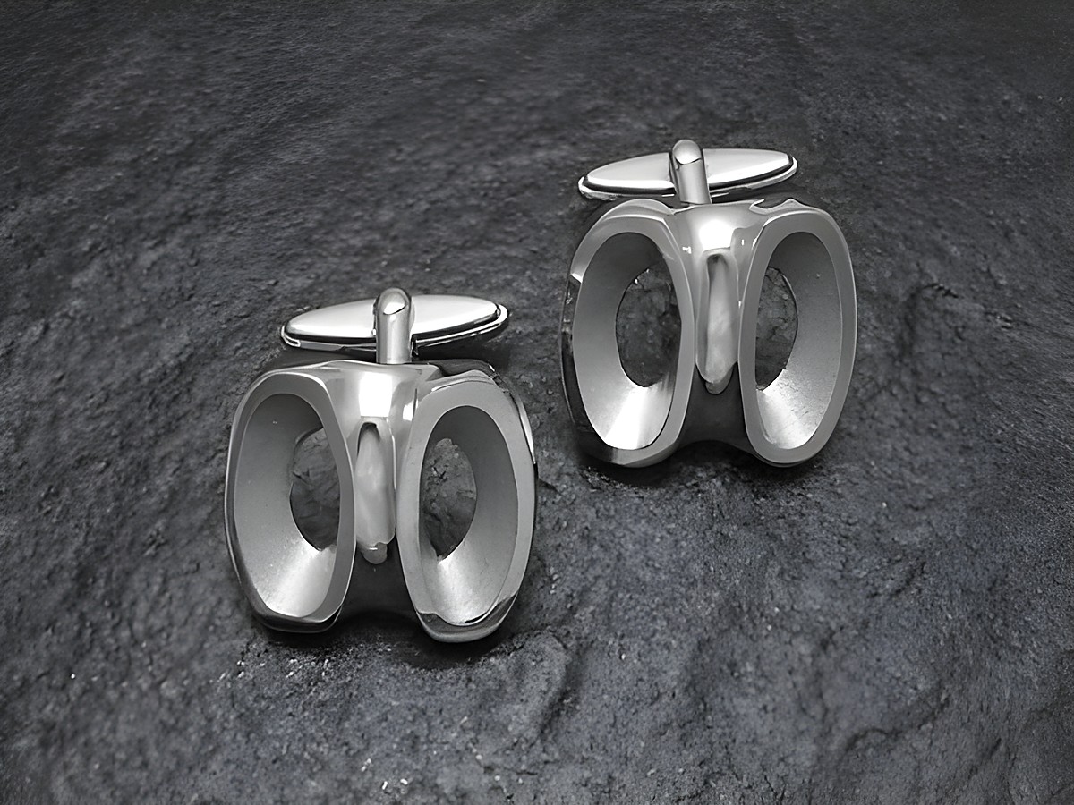 Manschettenknöpfe aus echtem Silber im Design der 70er Jahre, original und neu, hergestellt von Juwelier Harnisch, elegante Form und stilvolle Optik für besondere Anlässe.