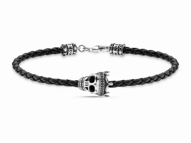 Schwarzes geflochtenes Lederarmband mit Totenkopf aus Sterling Silber und schwarzem Zirkonia, verziert mit Silberkappen, Gesamtlänge 19 cm. Ideal für einen trendigen Look.