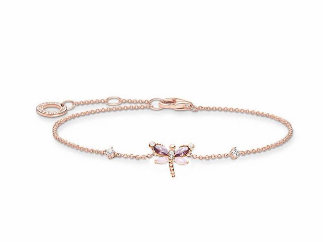 Thomas Sabo Charming Armband aus Sterling Silber mit vergoldeter Roségold-Optik, verziert mit Glas-Keramik Stein und Zirkonia, Drachenflieger-Design, verstellbar von 16 bis 19 cm.