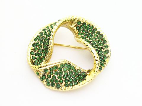 Strass Damen Brosche rund in grün, neu im retro Stil, Hersteller Juwelier Harnisch, verziert mit funkelnden grünen Strasssteinen und einem goldenen Rahmen. Ideal für eleganten Schmuck.