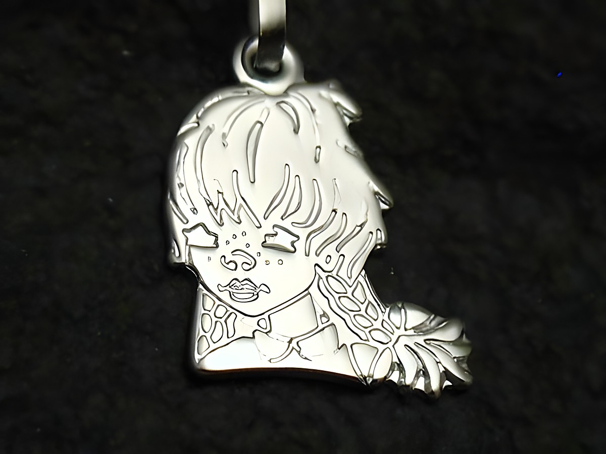 Mädchen Kopf als Sterling Silber Anhänger, gestaltet für Kinder, Hersteller Juwelier Harnisch, filigrane Zeichnung mit feinen Details und elegantem Design.