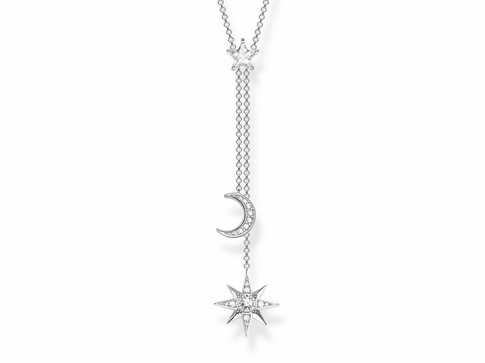 Eine elegante Thomas Sabo Kette aus Sterling Silber mit einem Anhänger in Form eines Mondes und eines Sterns, verziert mit weißen Zirkonia-Steinen. Die Längen sind 40 cm, 42,5 cm und 45 cm.