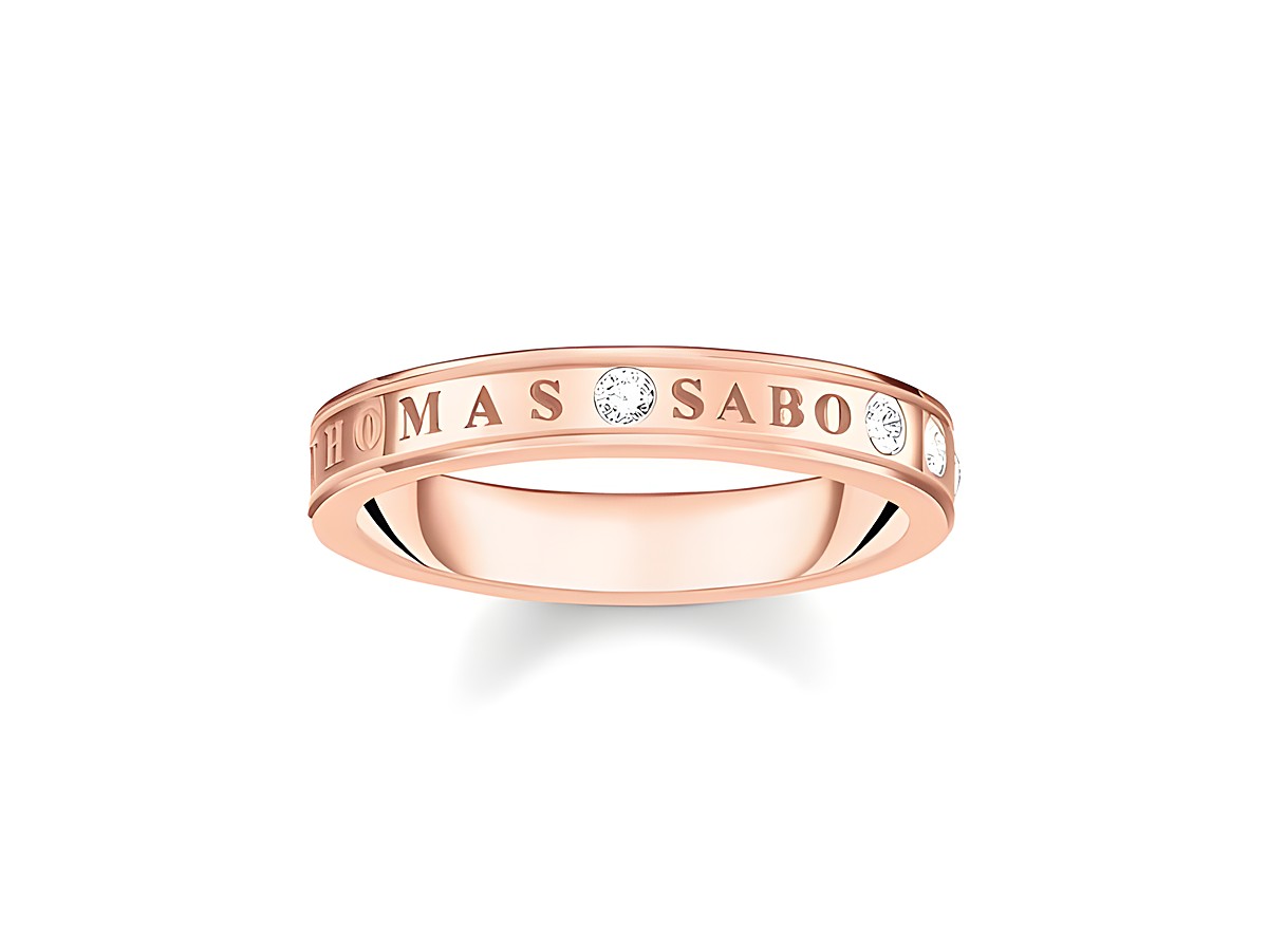 Silber vergoldeter Ring von Thomas Sabo in Roségold mit weißen Zirkonia, graviert mit THOMAS SABO, Größe 54. Elegantes und zeitloses Design, ideal als Schmuckstück für jeden Anlass.