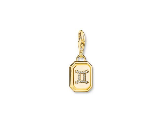 Charm-Anhänger von Thomas Sabo in Silber mit Vergoldung, im Design des Sternzeichens Zwilling, verziert mit Zirkonia-Steinen. Ideal für persönliche Schmuckkollektionen.
