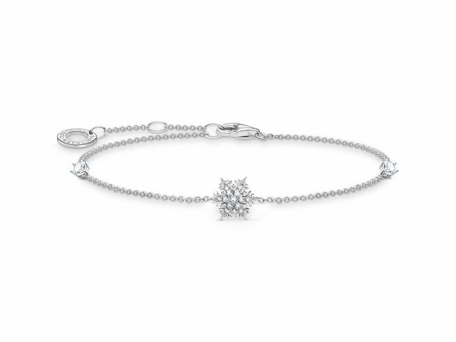 Elegantes Armband von Thomas Sabo aus Sterling Silber mit Zirkonia, verziert mit einer filigranen Schneeflocke und funkelnden Details, ideal für stilvolle Akzente.