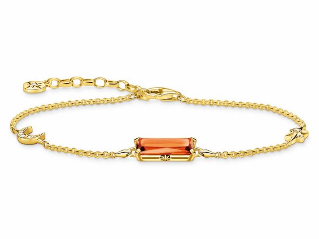 Silbernes, vergoldetes Armband von Thomas Sabo mit einem orangefarbenen Glas-Keramik Stein in der Mitte und Zirkonia-Details, verziert mit kleinen Symbolen, Länge 19 cm.