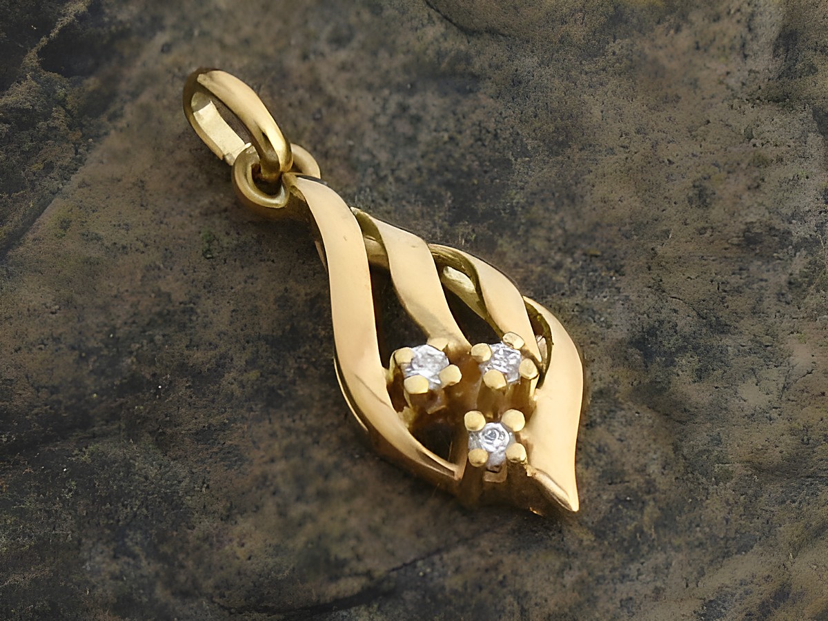 Silber Anhänger Zirkonia aus Sterling Silber vergoldet, Hersteller Juwelier Harnisch, elegantes Design mit drei funkelnden Zirkonia-Steinen. Ideal für stilvolle Akzente.
