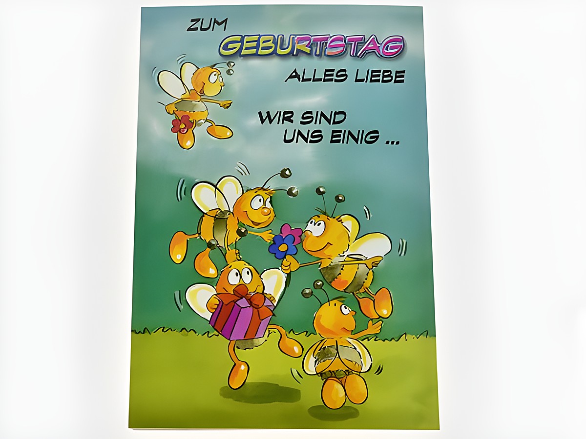 Geburtstagskarte mit fröhlichen Bienen, die Geschenke und Blumen halten. Der Text "Zum Geburtstag alles Liebe wir sind uns einig" steht prominent auf der Karte. Hersteller: Juwelier Harnisch.