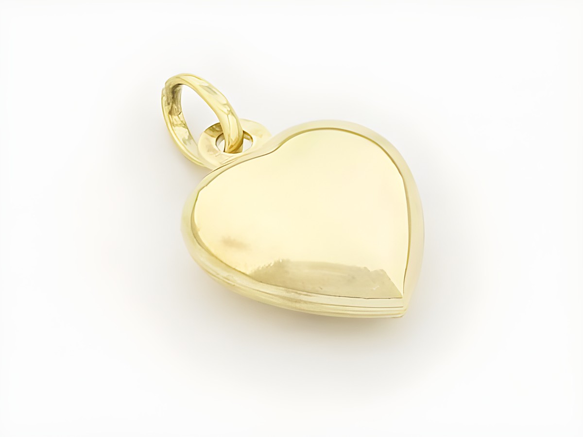 Herzanhänger aus 333 Gold, gefühlvoll und plastisch gestaltet, Hersteller Juwelier Harnisch, perfekt geeignet als besonderes Schmuckstück für verschiedene Anlässe.