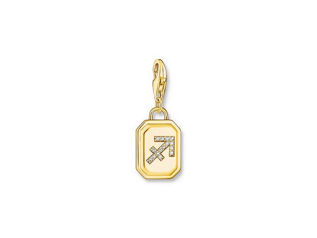 Charm-Anhänger von Thomas Sabo in Silber mit gelbgold vergoldeter Oberfläche, zeigt das Sternzeichen Schütze und ist mit Zirkonia verziert. Ideal für die persönliche Schmuckkollektion.