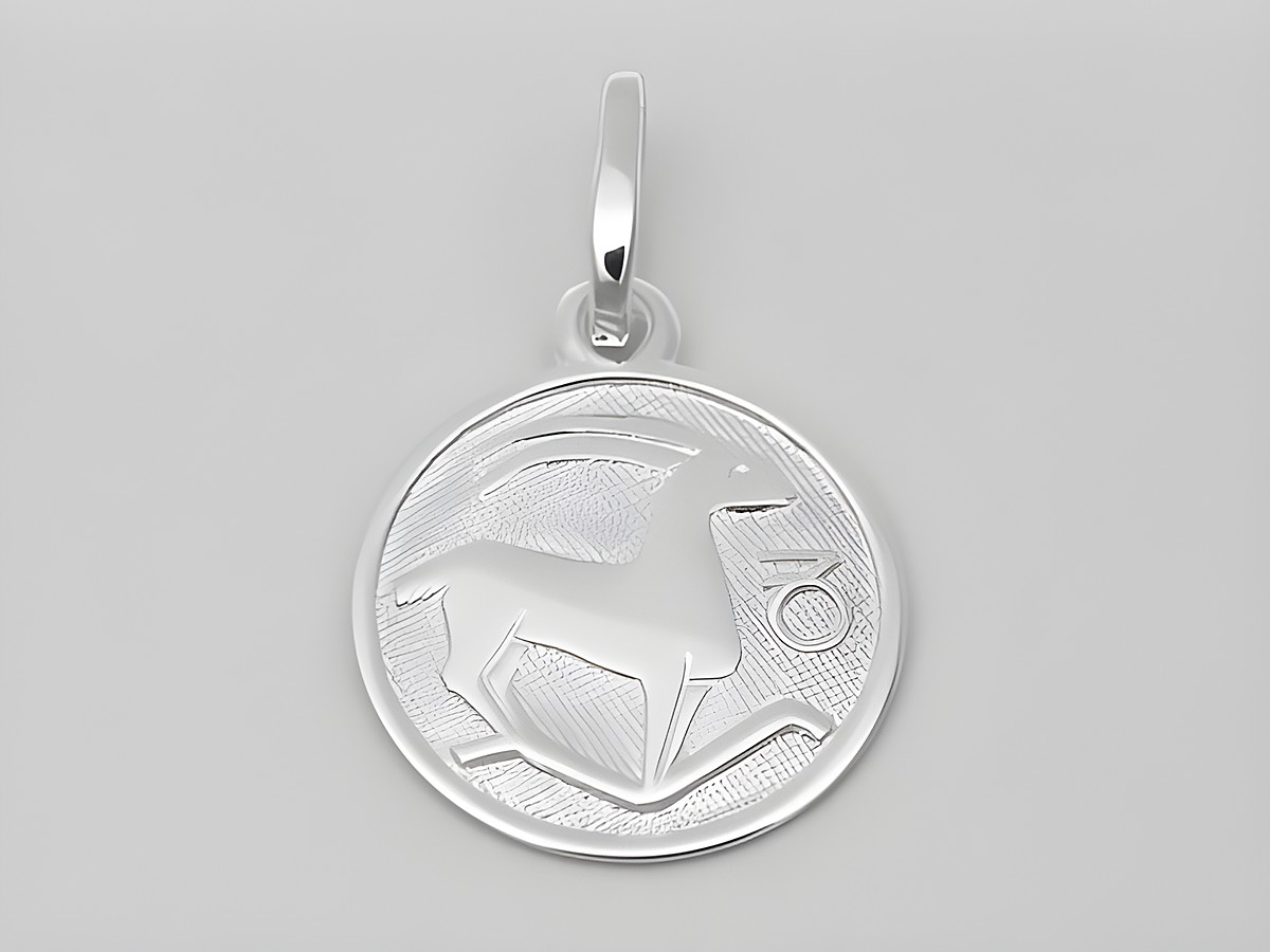 Steinbock Anhänger aus poliertem Weißgold 585 mit einem Durchmesser von 14 mm, gefertigt vom Juwelier Harnisch, zeigt das Symbol des Sternzeichens Steinbock.