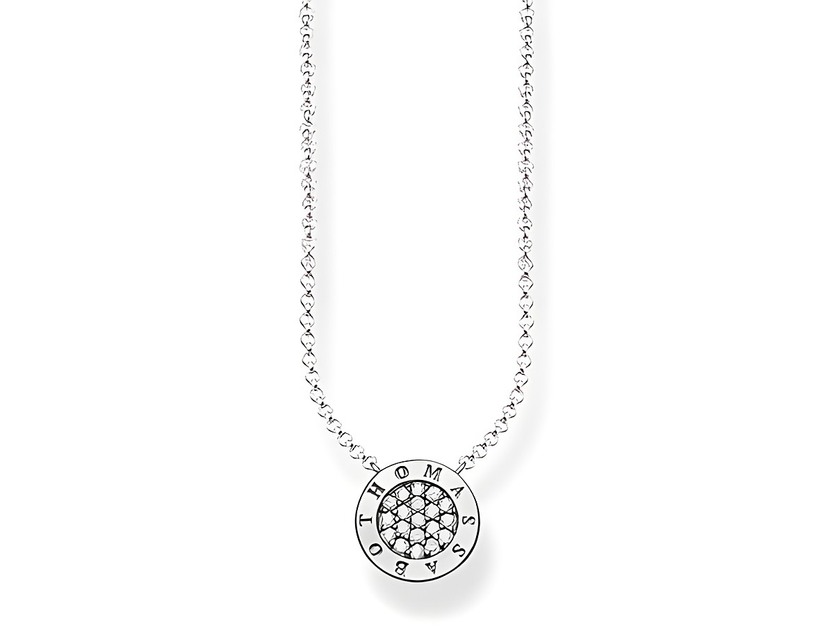 Kette aus Silber mit einem runden Anhänger, der mit weißen Zirkonia besetzt ist. Der Anhänger trägt den Schriftzug Thomas Sabo. Verstellbare Länge 40/42,5/45 cm. Ideal für jeden Anlass.
