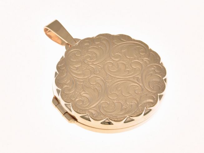Medaillon rund im Diamantschliff aus Sterling Silber, roségold vergoldet mit reizendem, filigranen Muster, Hersteller Juwelier Harnisch, ideal als Ausdruck von Eleganz und Stil.