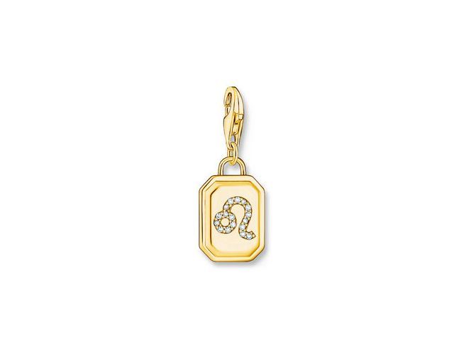 Charm-Anhänger von Thomas Sabo aus Silber mit vergoldetem Finish, gestaltet als Sternzeichen Löwe, mit funkelnden Zirkonia-Steinen verziert, ideal für individuelle Schmuckstücke.