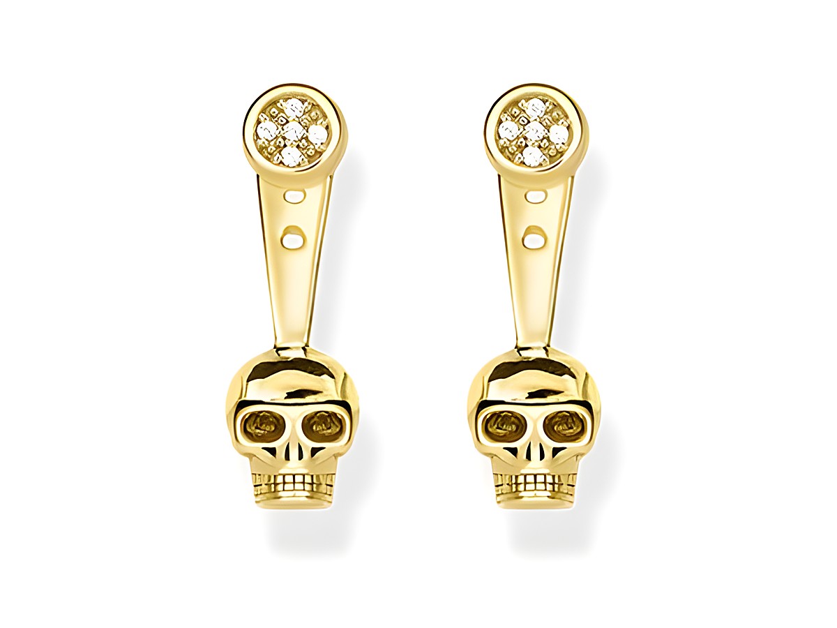 Ohrstecker von Thomas Sabo in gold mit Totenkopf-Design und funkelnden Steinchen, die in einem eleganten Ear Jacket-Stil präsentiert werden.