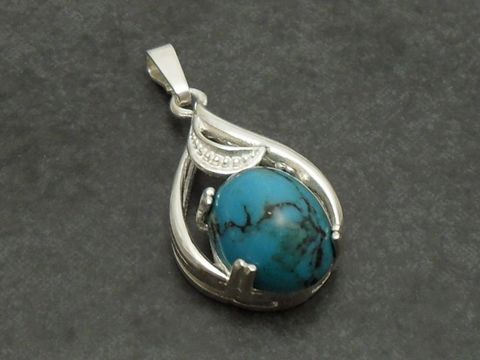 Silber Anhänger mit Türkis und Blätterdesign, hergestellt von Juwelier Harnisch, verziert mit weiteren Steinen. Ideal für Schmuckliebhaber, die edles Design schätzen.