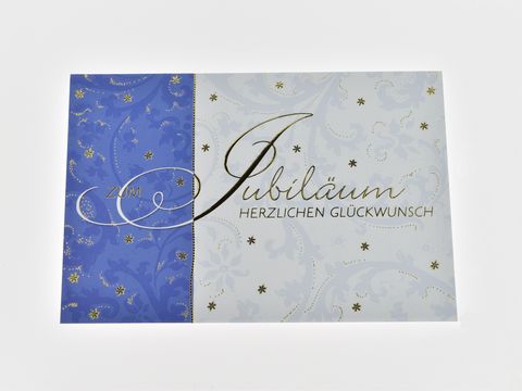 Glückwunschkarte mit floralem Muster und goldenen Akzenten, Hersteller Juwelier Harnisch. Auf der Karte steht Jubiläum Herzlichen Glückwunsch.