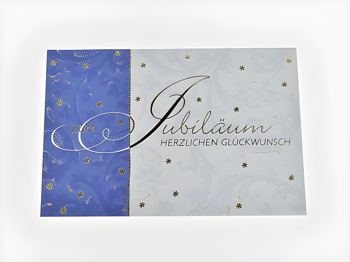 Glückwunschkarte mit floralem Muster und goldenen Akzenten, Hersteller Juwelier Harnisch. Auf der Karte steht Jubiläum Herzlichen Glückwunsch.