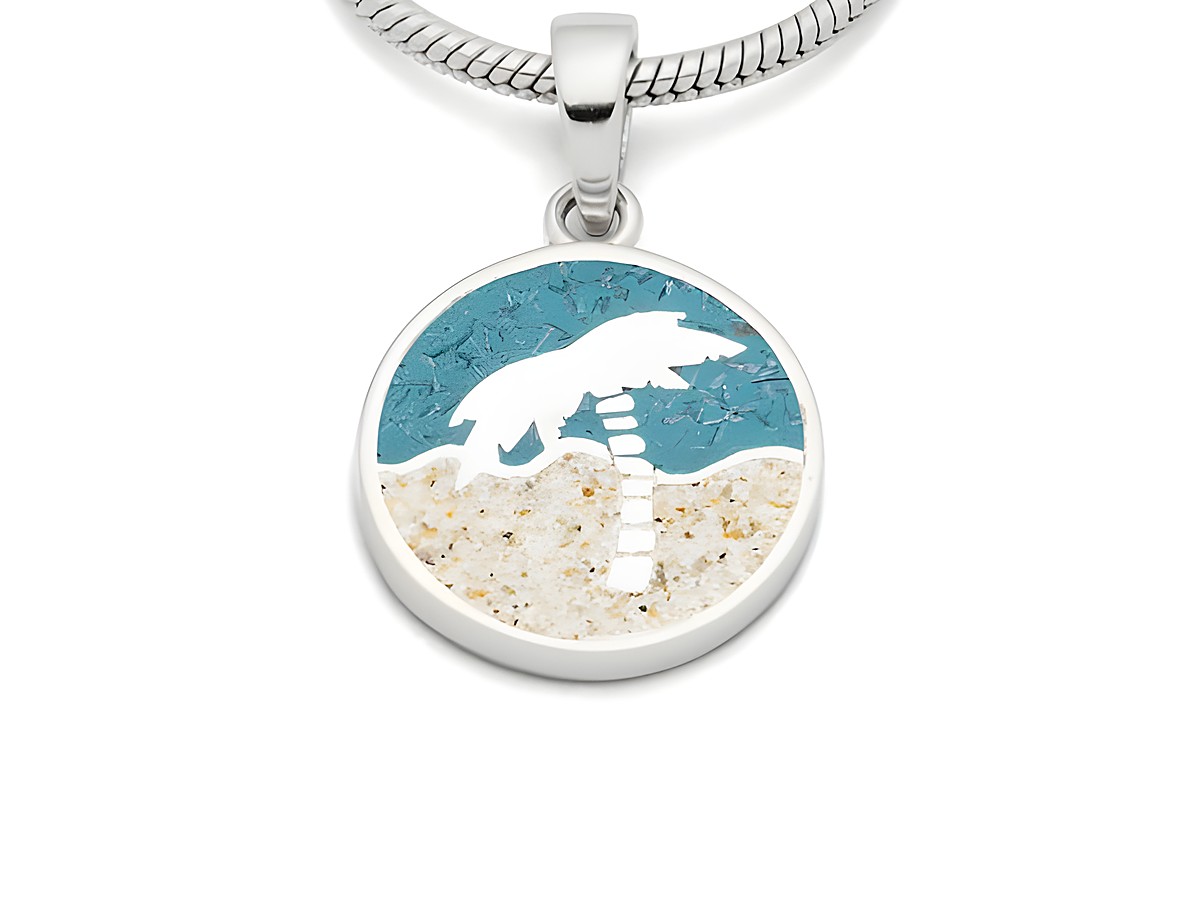 DUR Anhänger Palme P4332 aus Sterling Silber zeigt eine runde Oberfläche mit einer stilisierten Palme, turquoise Hintergrund und sandfarbener Unterlage, ideal für sommerliche Akzente.