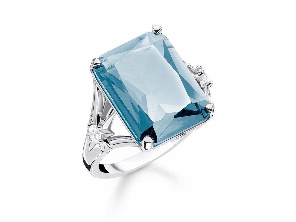 Thomas Sabo Ring aus Sterling Silber mit einem großen, hellblauen synthetischen Spinell und Zirkonia, Größe 48, elegantes Design mit funkelnden Details.