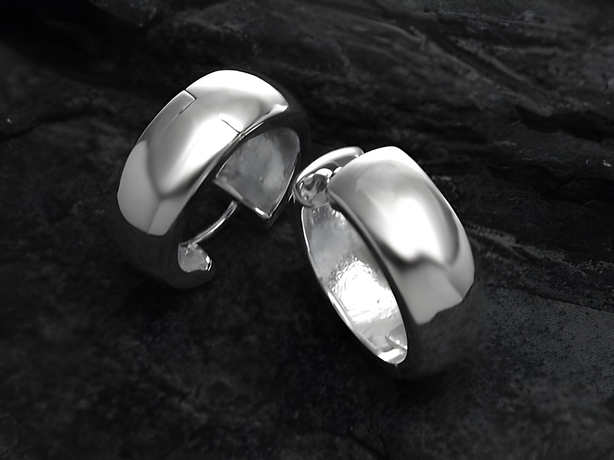 Moderne Creolen aus 925 Sterling Silber, rhodiniert, klassisch, mit einer Größe von bis zu 25 mm, hergestellt von Juwelier Harnisch. Elegantes Design für jeden Anlass.