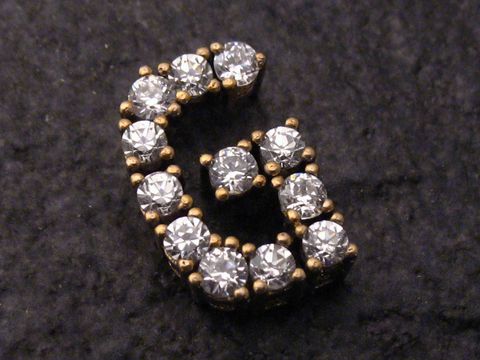 Gold Buchstaben Anhänger G mit Zirkonia, funkelnd und elegant, hochwertiger Schmuck des Herstellers Juwelier Harnisch, ideal als persönliches Geschenk oder für den eigenen Stil.