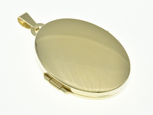 Medaillon oval in Sterling Silber und gelbgold vergoldet klassisch gefertigt vom Juwelier Harnisch, elegant und zeitloses Schmuckstück, geeignet für persönliche Erinnerungen.
