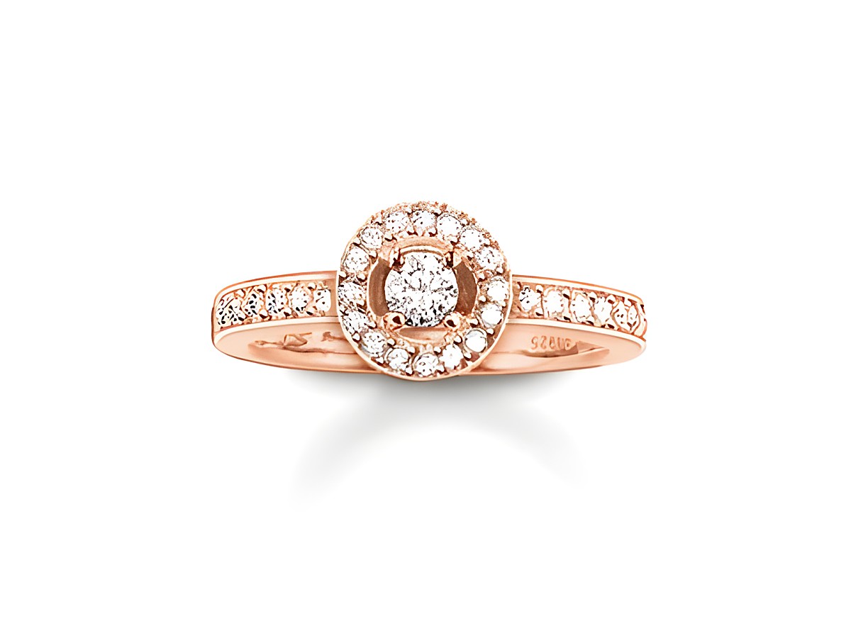 Thomas Sabo Ring TR1975-416-14-52 aus Silber in vergoldetem Roségold mit Zirkonia, Größe 52, präsentiert einen funkelnden Stein in der Mitte und schimmernde Details.