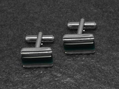 10438-0 Manschettenknöpfe in grünem Design, 16,2 mm, silberfarben, von Hersteller Juwelier Harnisch, elegantes Accessoire für formelle Anlässe, zeitlos und stilvoll.