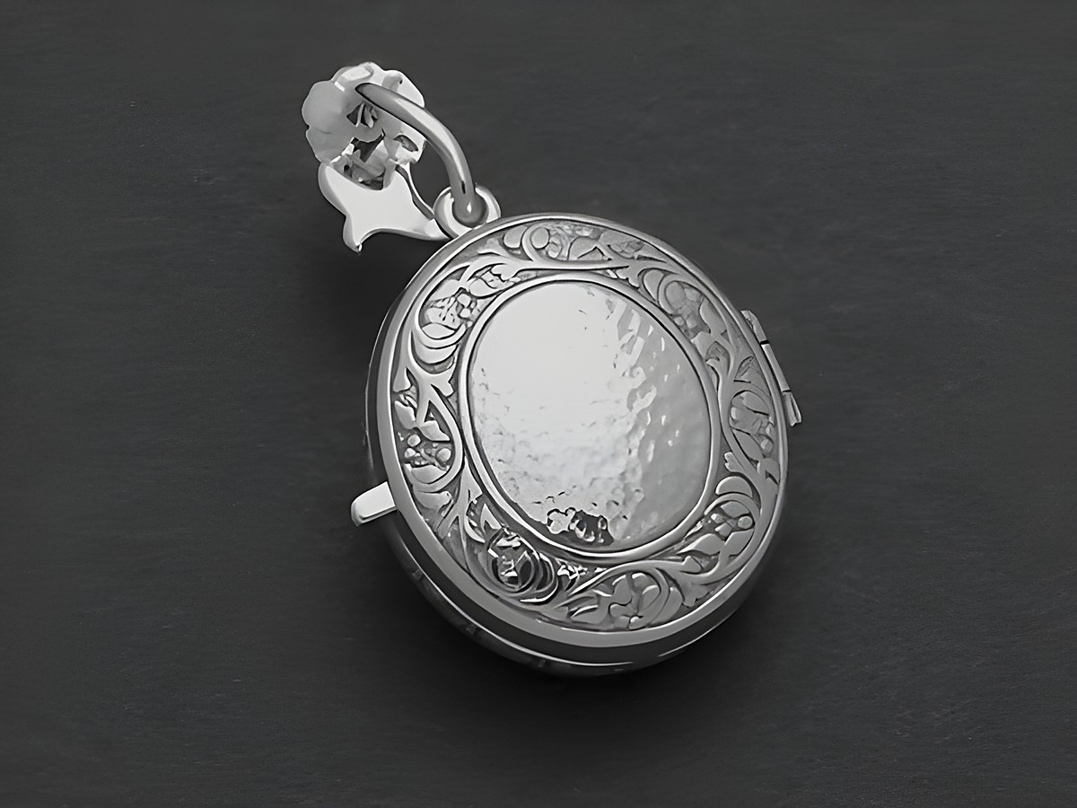Runder Medaillon Grant königlich nostalgisch aus Sterling Silber, verziert mit filigranen Mustern und einer leicht gehämmerten Oberfläche, Hersteller Juwelier Harnisch. – Ansicht 2