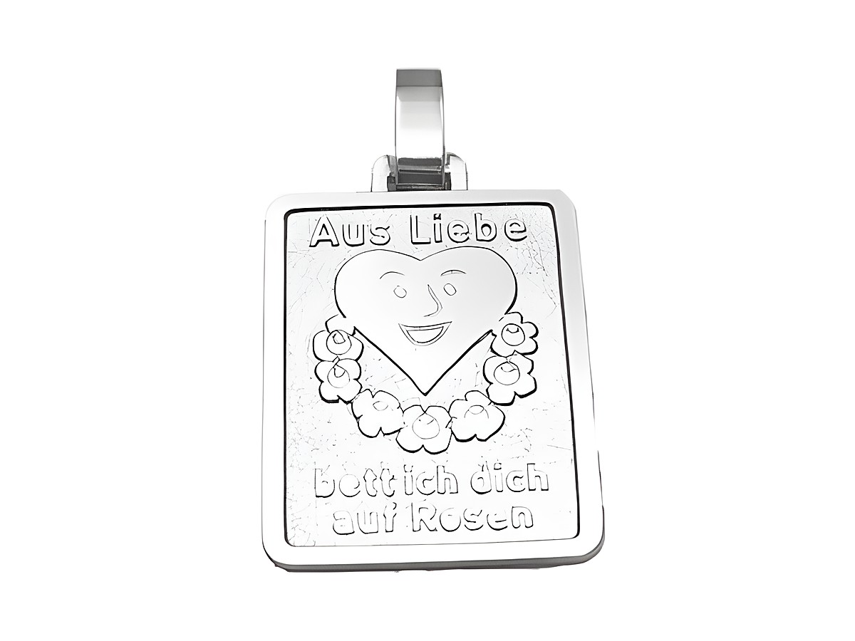 Silber Anhänger mit dem Motiv Aus Liebe bette ich Dich auf Rosen, gefertigt von Juwelier Harnisch, zeigt ein Herz umgeben von Blumen und lächelndem Gesicht.