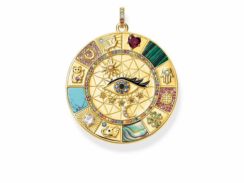 Anhänger von Thomas Sabo in Form eines Glücksrads aus Sterling Silber, vergoldet in Gelbgold, verziert mit Zirkonia in bunten Farben und verschiedenen Glückssymbolen.