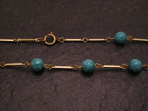 Kette im Türkis Look 60 cm lang, 9x9 mm breit, hergestellt von Juwelier Harnisch, mit Stein-Elementen, ideal für stilvolle Akzente.