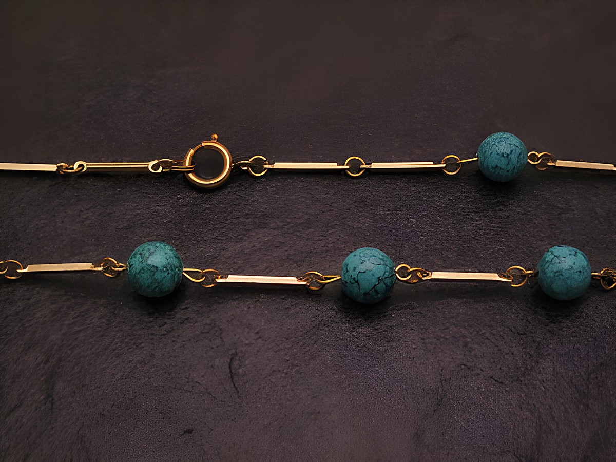 Kette im Türkis Look 60 cm lang, 9x9 mm breit, hergestellt von Juwelier Harnisch, mit Stein-Elementen, ideal für stilvolle Akzente.