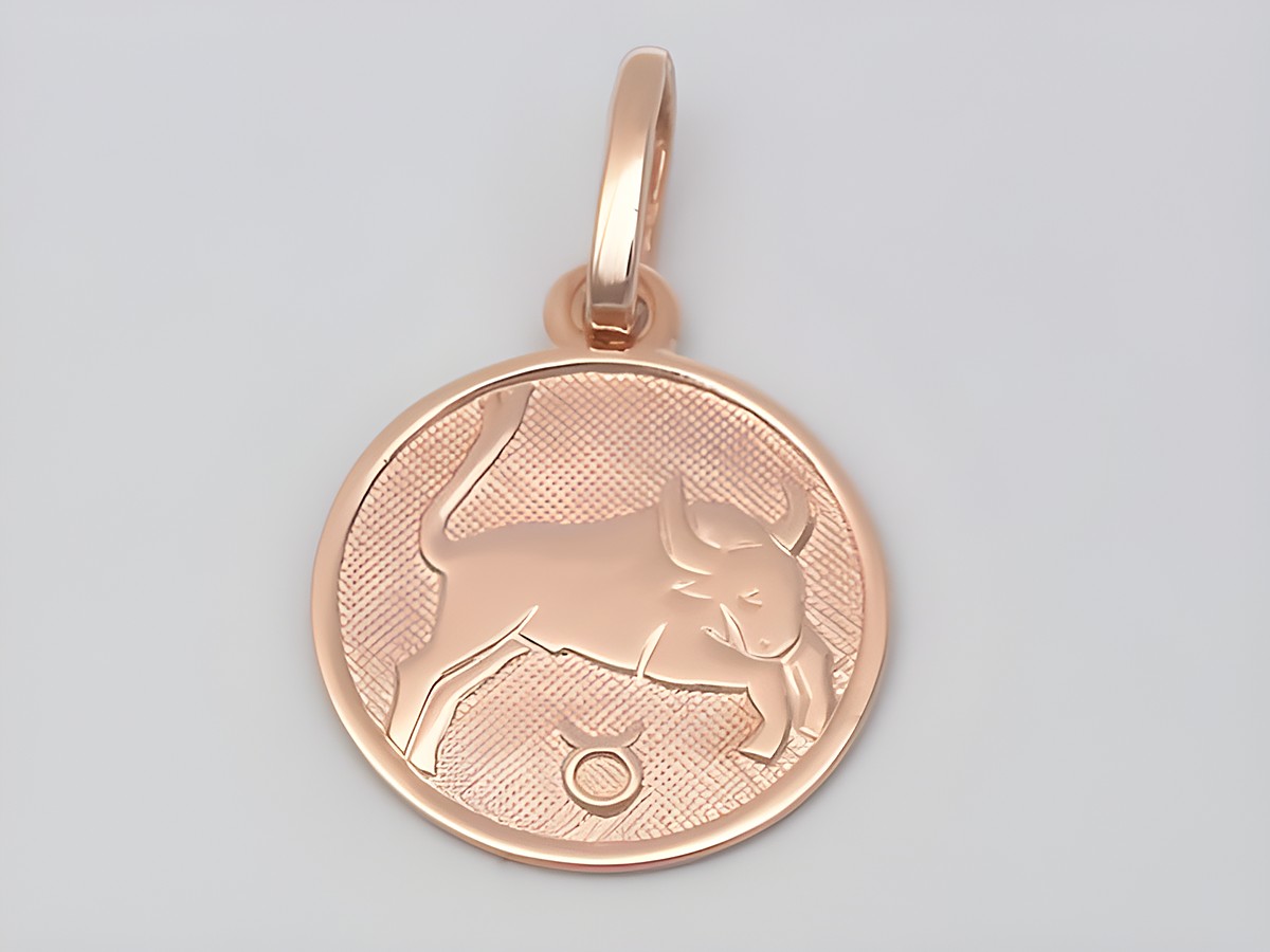 Stier Anhänger aus rosé vergoldetem Sterlingsilber, poliert, mit einer Darstellung eines Stiers und dem Sternzeichen Symbol, Durchmesser 14 mm, Hersteller Juwelier Harnisch.