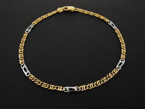 Armband Stäbchenpanzer aus Gold 750 bicolor mit 3 x 1,1 mm Gliedern und einer Länge von 19 cm, hergestellt von Juwelier Harnisch, ideal für stilvolle Akzente.