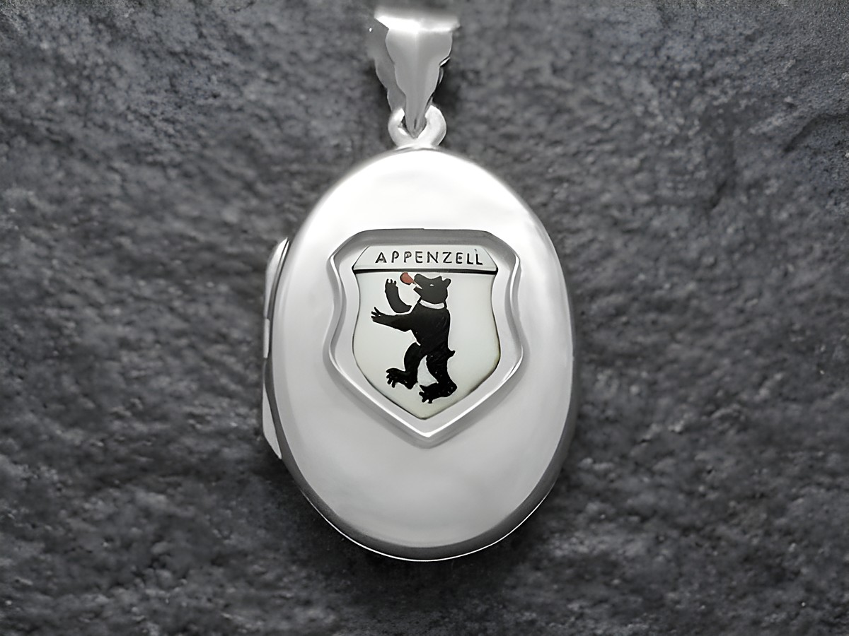 Silbernes Medaillon mit dem Stadtwappen von Appenzell, Schweiz, zeigt einen schwarzen Bären auf weißem Hintergrund. Hersteller Juwelier Harnisch, Europa Medaillons.