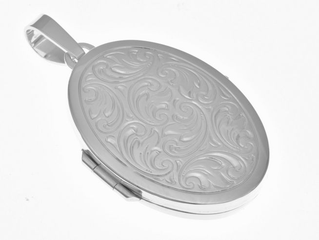 Medaillon oval mit Diamantschliff aus rhodiniertem Sterling Silber, kunstvoll verschlungenes Design, Hersteller Juwelier Harnisch. Elegant und zeitlos für besondere Anlässe.