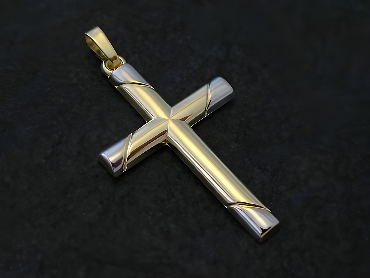 Modernes Goldkreuz aus bicolor Gold 333, hergestellt von Juwelier Harnisch, zeigt einen eleganten und zeitlosen Anhänger in glänzender Ausführung auf schwarzem Hintergrund.