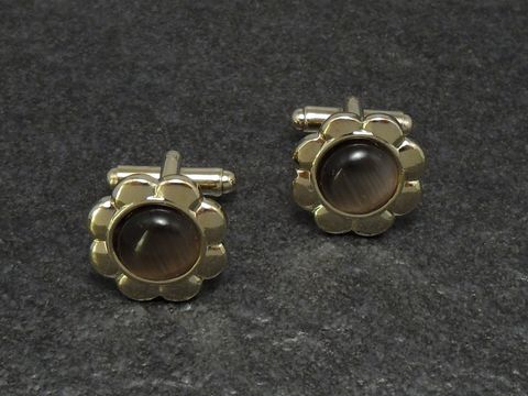 Manschettenknöpfe in braunem Design mit einem Durchmesser von 17,2 mm, goldfarben, Hersteller Juwelier Harnisch, stilvolle Ergänzung für elegante Hemden.