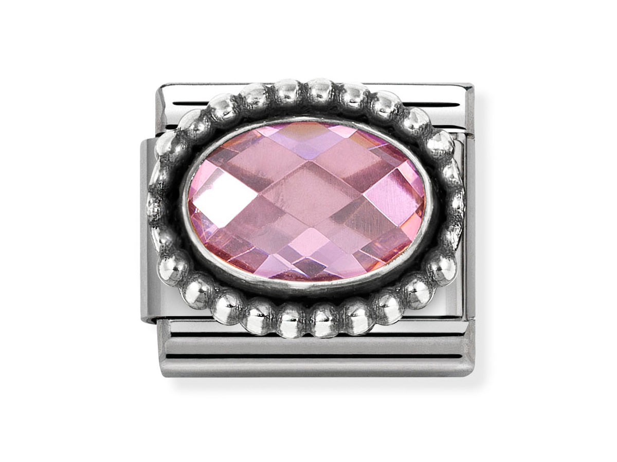 Das Bild zeigt ein elegantes Element von Nomination in Sterling Silber, mit ovalem rosa Zirkonia und einem dekorativen Rand aus kleinen Kugeln, ideal für Schmuckliebhaber.