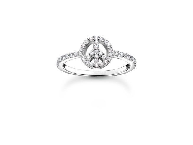 Thomas Sabo Ring TR2373-051-14-56 aus Sterling Silber mit weißem Zirkonia in Größe 56, design mit Peace-Zeichen in der Mitte und funkelnden Steinen am Band.