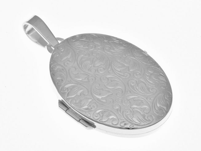 Medaillon oval aus Sterling Silber mit rhodiniertem Diamantschliff und verschlungenem Design, Hersteller Juwelier Harnisch. Ideal für persönliche Erinnerungen.