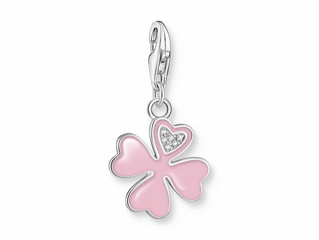 Charm-Anhänger von Thomas Sabo in Form eines pinken Glücksklees mit einem funkelnden Zirkonia-Herz, gefertigt aus Silber und Emaille, ideal für persönliche Accessoires.
