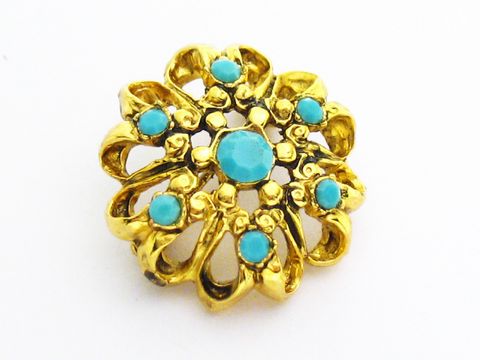 Brosche im Sexy City Look in Türkis farbig rund, Hersteller Juwelier Harnisch, dekorativ mit goldenen Elementen und türkisen Akzenten, ideal als modisches Accessoire.