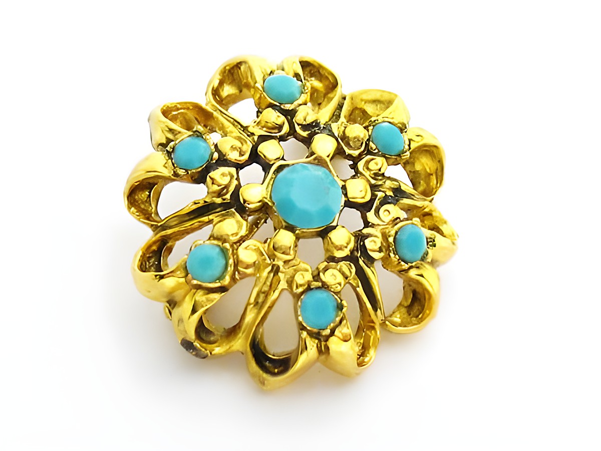 Brosche im Sexy City Look in Türkis farbig rund, Hersteller Juwelier Harnisch, dekorativ mit goldenen Elementen und türkisen Akzenten, ideal als modisches Accessoire.