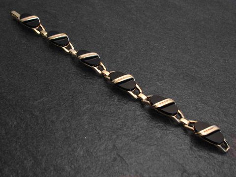 Silberarmband vergoldet 19 cm Design mit Onyx von Juwelier Harnisch, elegant und zeitlos, im Wechselspiel von gold und schwarzem Onyx, ideal für besondere Anlässe oder den Alltag.